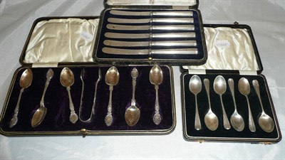 Lot 283 - A set of six silver teaspoons and tongs, a set of six teaspoons and a set of fruit knives