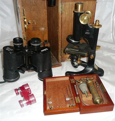 Lot 284 - A Beck monocular compound microscope in mahogany case and a cased pair of UNIFOT 10x50, a pair...