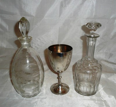 Lot 287 - A Victorian silver goblet, a decanter etched with an antelope and another