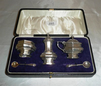 Lot 293 - A cased silver three piece cruet