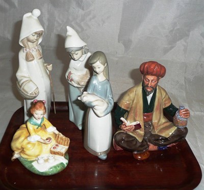 Lot 303 - A Doulton figure 'Picnic', another 'Omar Khayyam', and three Lladro figures