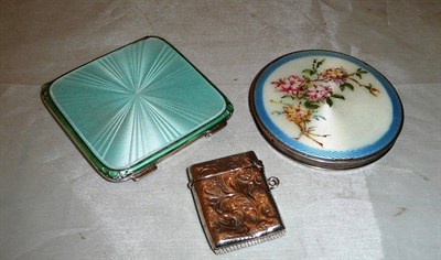 Lot 313 - Two silver enamel compacts and a vesta