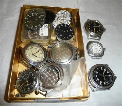 Lot 315 - A quantity of military watch dial cases, a Hamilton military wristwatch and a chrome boy's size...