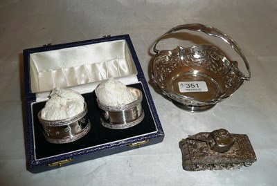 Lot 351 - Two silver napkin rings, a silver bonbon dish and a miniature tank