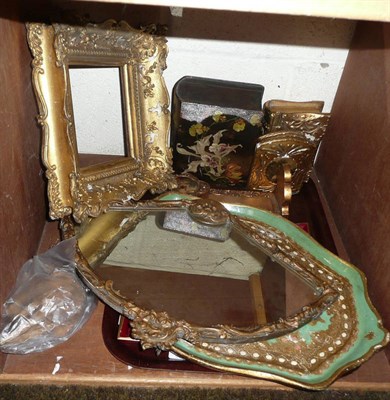 Lot 361 - Gilt and gesso picture frame, religious icon, book slide, small mirror, wooden trays, a silver...