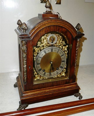 Lot 372 - An oak striking table clock, movement stamped 'W & H'