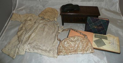 Lot 390 - A miniature oak coffer, autograph album, sketch book, child's gown, rubber car etc