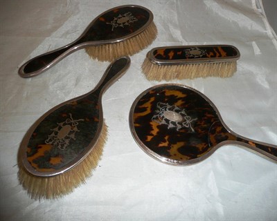 Lot 411 - A tortoiseshell brush set (a.f.)