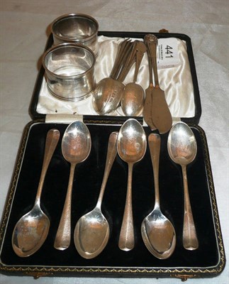 Lot 441 - A set of six silver teaspoons, a set of six coffee spoons, two silver napkin rings, two silver...