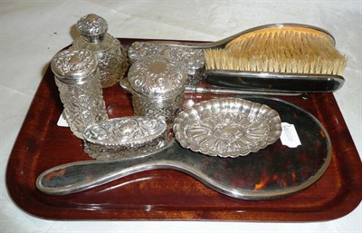 Lot 457 - Five silver topped toilet jars and boxes, a silver pin tray, and a tortoiseshell and silver...