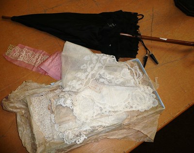 Lot 496 - A parasol and a collection of lace