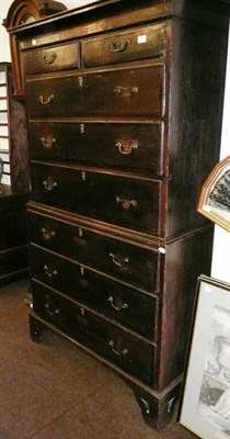 Lot 562 - A Georgian oak chest on chest