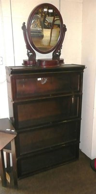 Lot 567 - An early 20th century Globe Wernicke glazed mahogany bookcase and a Victorian toilet mirror