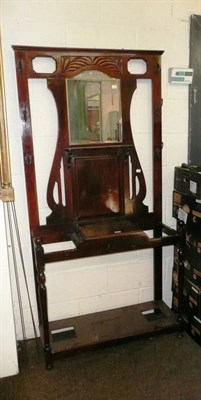 Lot 569 - A stained mahogany hall stand