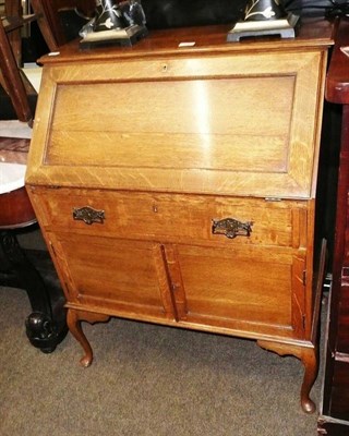 Lot 596 - Light oak bureau