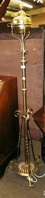 Lot 602 - A telescopic brass standard lamp