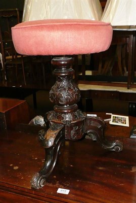 Lot 614 - A Victorian tripod piano stool (a.f.)