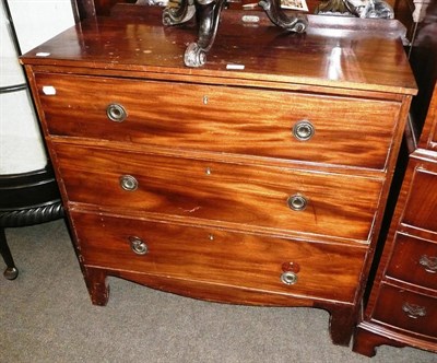 Lot 615 - Georgian mahogany three height chest of drawers