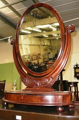 Lot 616 - A Victorian carved mahogany oval mirror