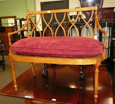 Lot 623 - Satinwood two seater settee