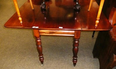 Lot 624 - A Victorian mahogany Pembroke table with turned legs and end drawer