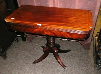 Lot 630 - 19th century mahogany inlaid tea table