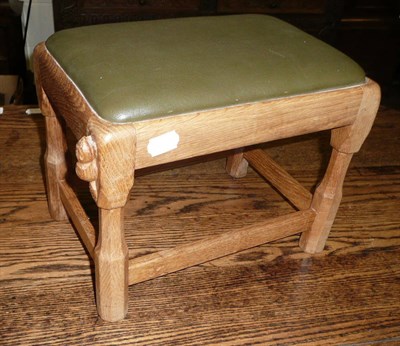 Lot 635 - A Colin 'Beaverman' Almack oak footstool, on four legs joined by stretchers, with carved beaver...