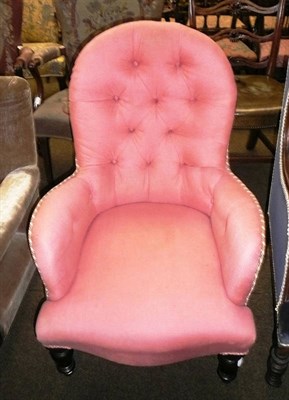 Lot 654 - A Victorian button back armchair in pink