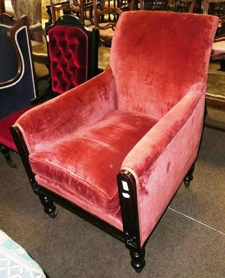 Lot 657 - Oak framed armchair upholstered in red velvet