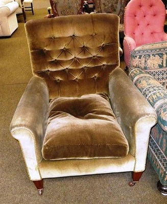 Lot 659 - Green button back armchair