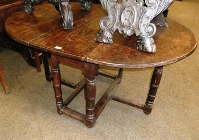 Lot 668 - Dutch oak gateleg table