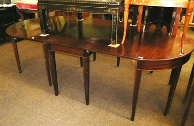 Lot 673 - George III mahogany D-end dining table