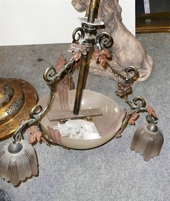 Lot 784 - A centre light fitment with stylised glass shade