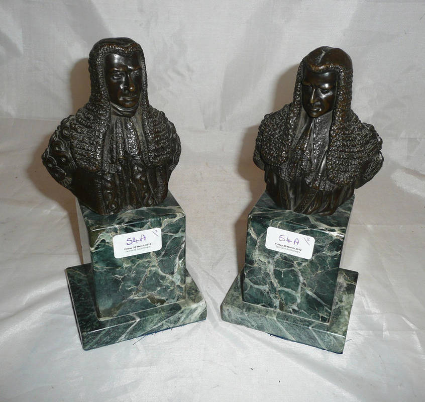 Lot 54 - A matched pair of bronze busts of 17th century gentlemen, 19th century, wearing long wigs and...