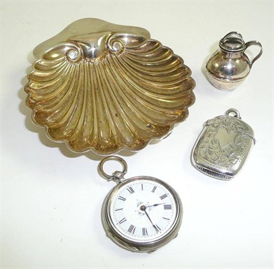 Lot 8 - A silver butter dish, a vesta case, a silver flagon and a pocket watch