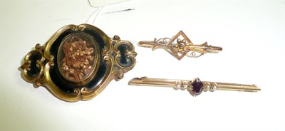 Lot 10 - A garnet and seed pearl bar brooch, a floral bar brooch and a mourning brooch