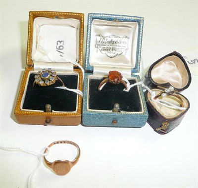 Lot 12 - A 9ct gold signet ring, a diamond and cultured pearl three stone ring, a sapphire cluster ring...