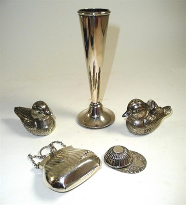 Lot 23 - Silver jockey's cap caddy spoon, silver purse, spill vase and a pair of plated duck peppers