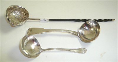 Lot 31 - A silver toddy ladle with baleen handle, a silver sauce ladle and a plated ladle