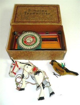 Lot 52 - Simplex tinplate typewriter, clockwork bird and Muffin the Mule puppet (3)