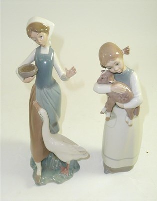 Lot 55 - Two Lladro china figures