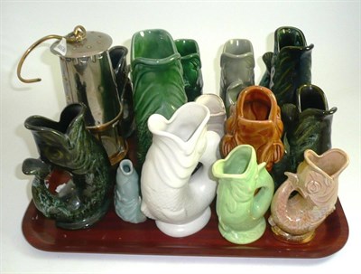 Lot 56 - Collection of pottery fish 'gurgling jugs' and a miner's lamp