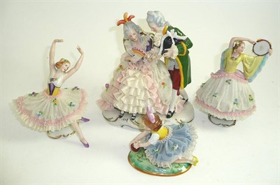 Lot 59 - Four Sitzendorf crinoline figures