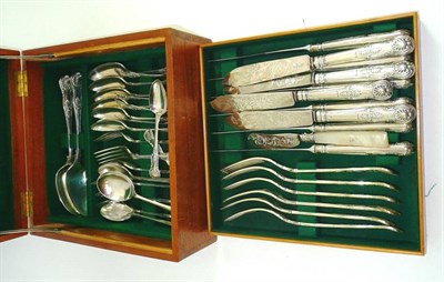 Lot 94 - A part canteen of Queen's pattern cutlery, comprising two serving spoons, six table spoons, six...