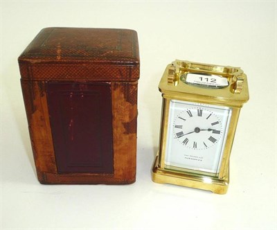 Lot 112 - A French brass carriage timepiece in carrying case