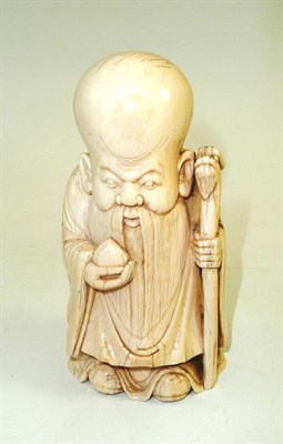 Lot 118 - An ivory figure of Shou Lao