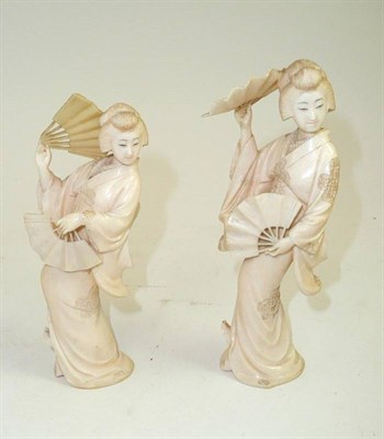 Lot 119 - Pair of ivory figures