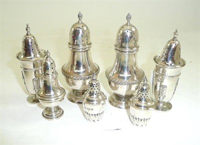 Lot 172 - Three pairs of silver pepperettes and a single silver pepperette