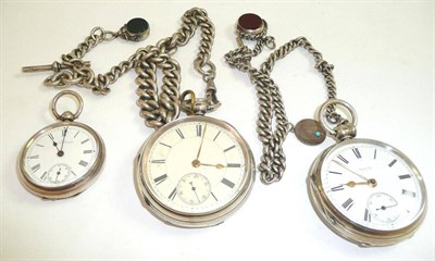 Lot 173 - Two silver cased key wound pocket watches, a similar fob watch and two silver Albert chains