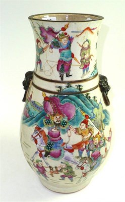 Lot 196 - A late 19th century Chinese famille rose vase with simulated bronze mask handles, damaged